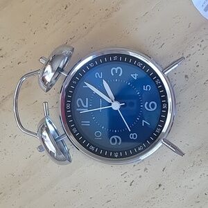 Cute silver (stainless steel) manual loud alarm clock for heavy sleepers